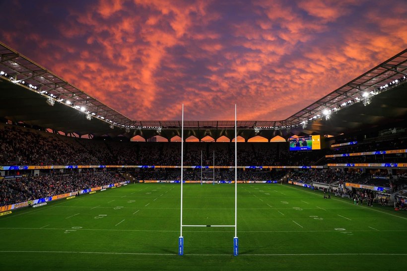 CommBank Stadium under a sunset sky